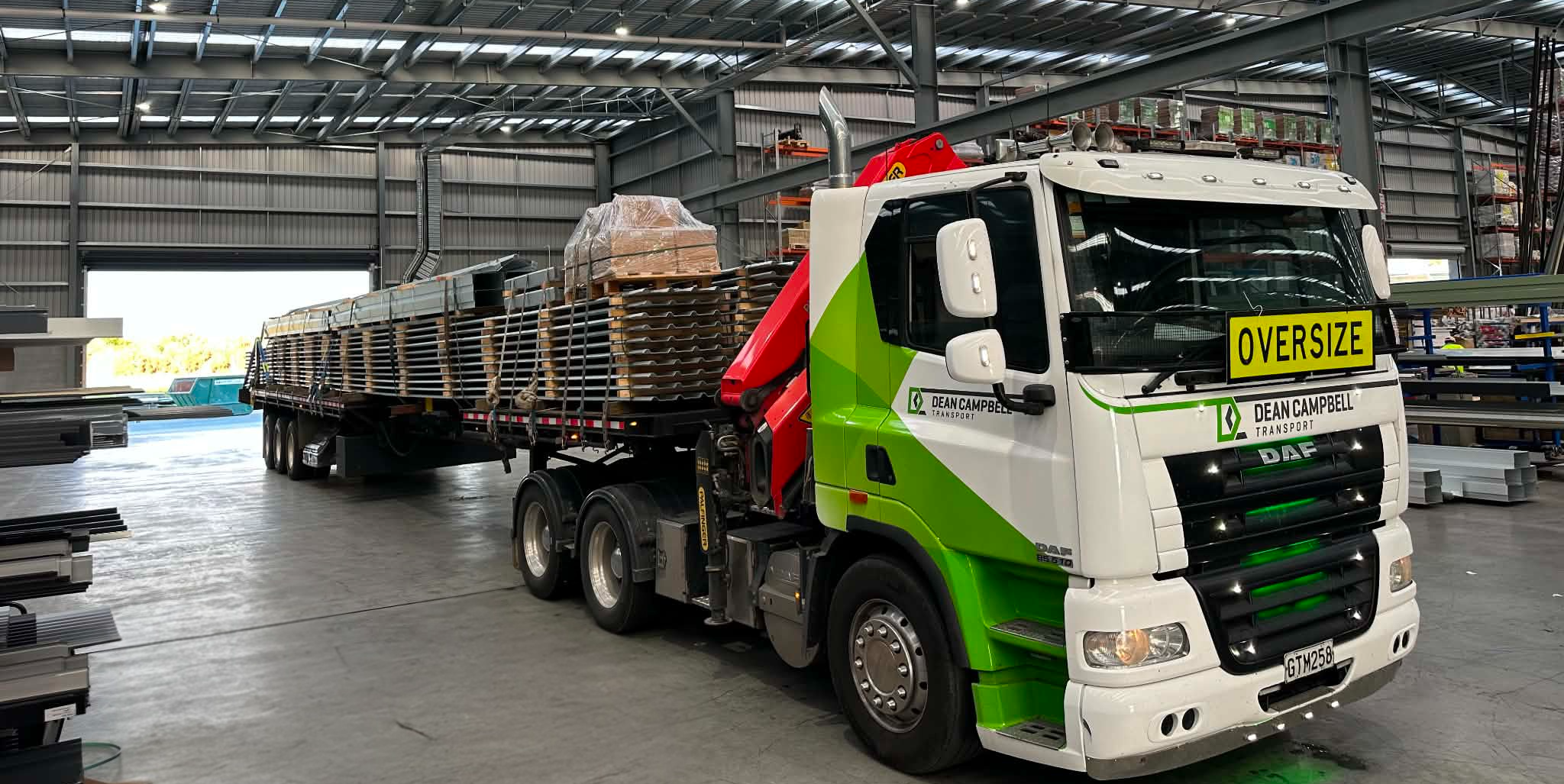 GTM258 loaded with an oversize steel load in the warehouse