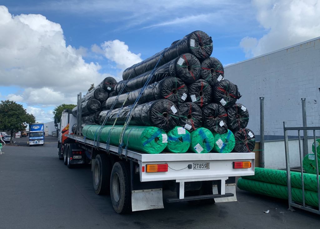 Flatdeck loaded with coiled pipe