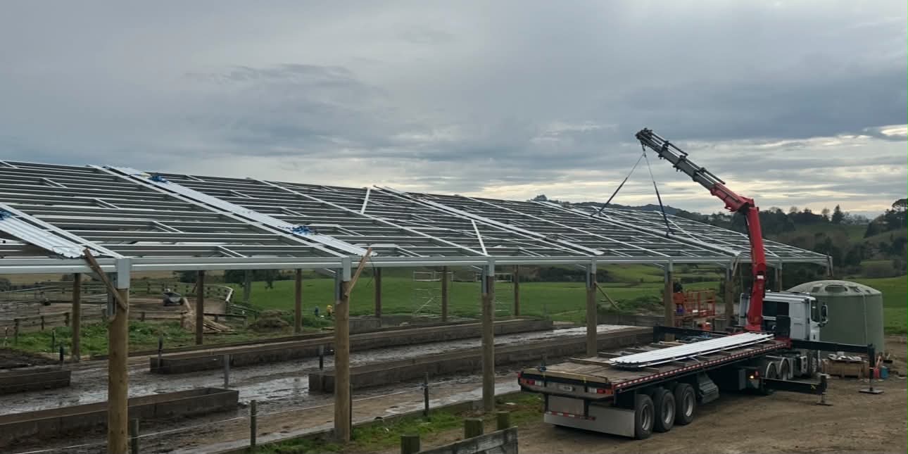 HIAB placing purlins on a new shed roof